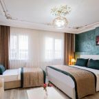 Четырехместный (Четырехместный номер с видом на сад), Atam Suites & Apartments