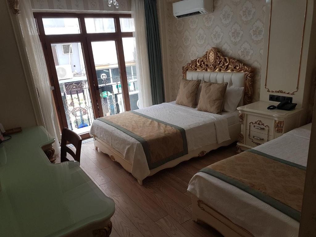 Двухместный (Улучшенный двухместный номер с 2 отдельными кроватями) отеля Best Town Hotel, Стамбул