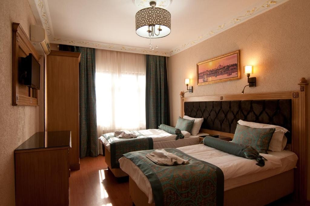Двухместный (Стандартный двухместный номер с 2 отдельными кроватями) отеля Blue Tuana Hotel, Стамбул