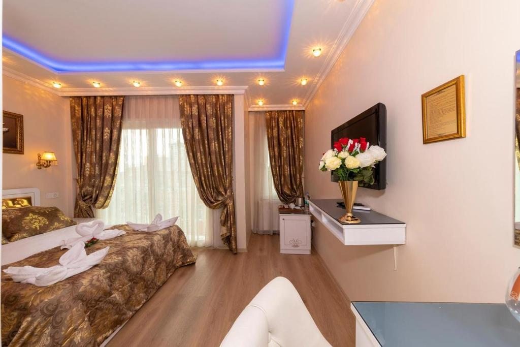 Двухместный (Двухместный номер Делюкс с 1 кроватью и балконом) отеля Charm Hotel, Стамбул