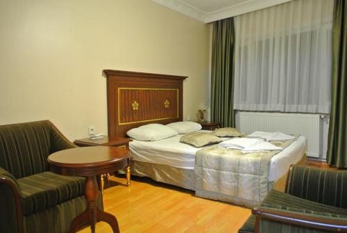 Семейный (Апартаменты - Первый этаж) апарт-отеля Emirhan Inn Apart Hotel, Стамбул