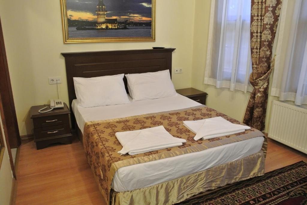 Двухместный (Двухместный номер с 1 кроватью или 2 отдельными кроватями и собственной ванной комнатой) апарт-отеля Emirhan Inn Apart Hotel, Стамбул