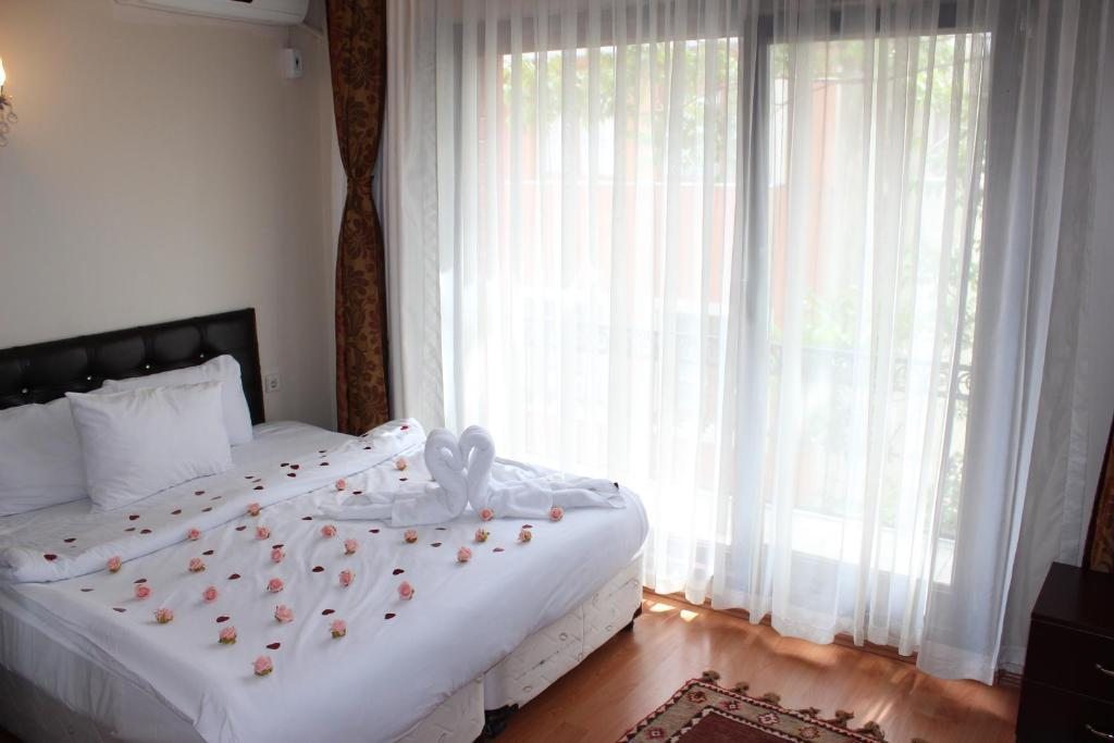 Двухместный (Стандартный двухместный номер с 1 кроватью или 2 отдельными кроватями) отеля Ercan Inn Hotel, Стамбул