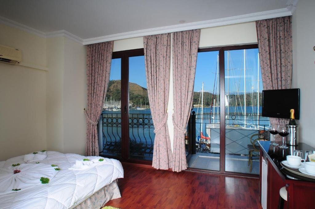 Двухместный (Двухместный номер Делюкс с 1 кроватью или 2 отдельными кроватями и видом на море) отеля Ata Park, Фетхие