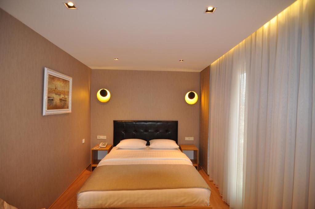 Двухместный (Стандартный двухместный номер с 1 кроватью или 2 отдельными кроватями) отеля Hotel Bosfora, Стамбул