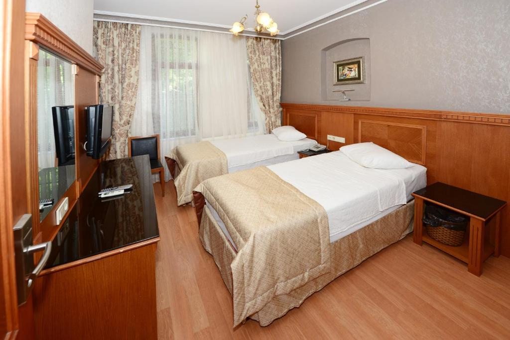 Двухместный (Стандартный двухместный номер с 1 кроватью или 2 отдельными кроватями) отеля Hotel New House, Стамбул