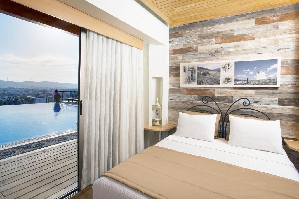 Двухместный (Двухместный номер Делюкс с 1 кроватью и видом на море) отеля Alacati VillaRenk, Алачати