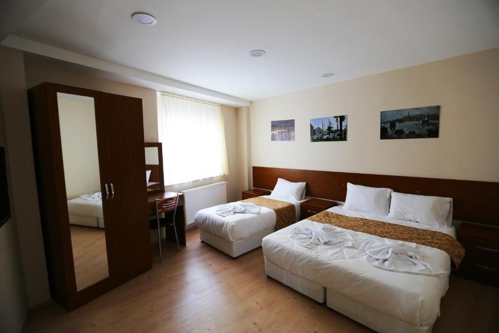 Апартаменты (Апартаменты с 2 спальнями (для 3 взрослых)) апарт-отеля Istanbul Family Apartments, Стамбул