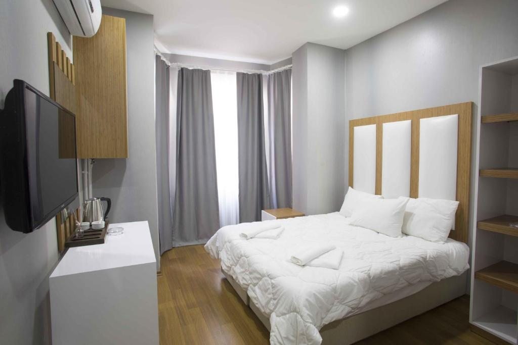 Двухместный (Двухместный номер Делюкс с 1 кроватью) отеля La Pazza Suites, Стамбул