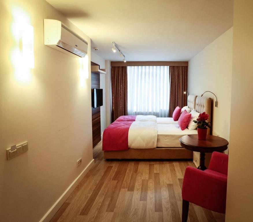 Двухместный (Двухместный номер Делюкс с 1 кроватью или 2 отдельными кроватями) отеля Melek Hotels Moda, Стамбул