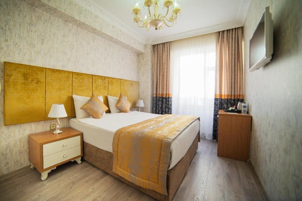 Двухместный (Улучшенный двухместный номер с 1 кроватью или 2 отдельными кроватями) отеля Miran Hotel, Стамбул