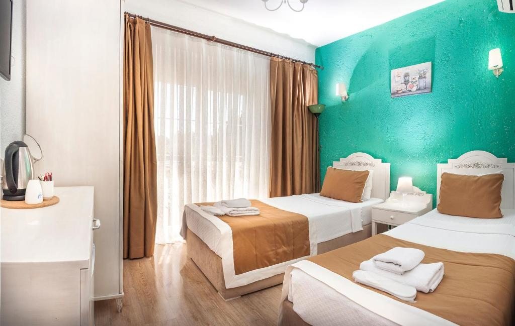 Двухместный (Стандартный двухместный номер с 2 отдельными кроватями) отеля Sandal Alaçatı - Adult Only, Алачати