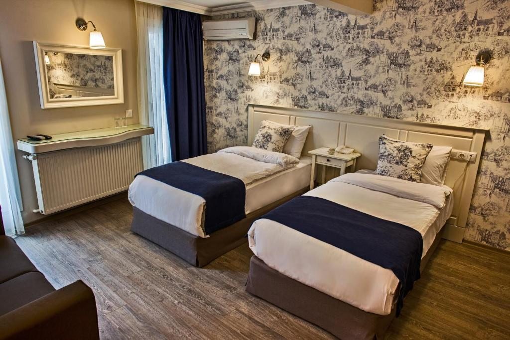 Двухместный (Двухместный номер Делюкс с 1 кроватью или 2 отдельными кроватями) отеля Mr. Bird Hotel, Стамбул