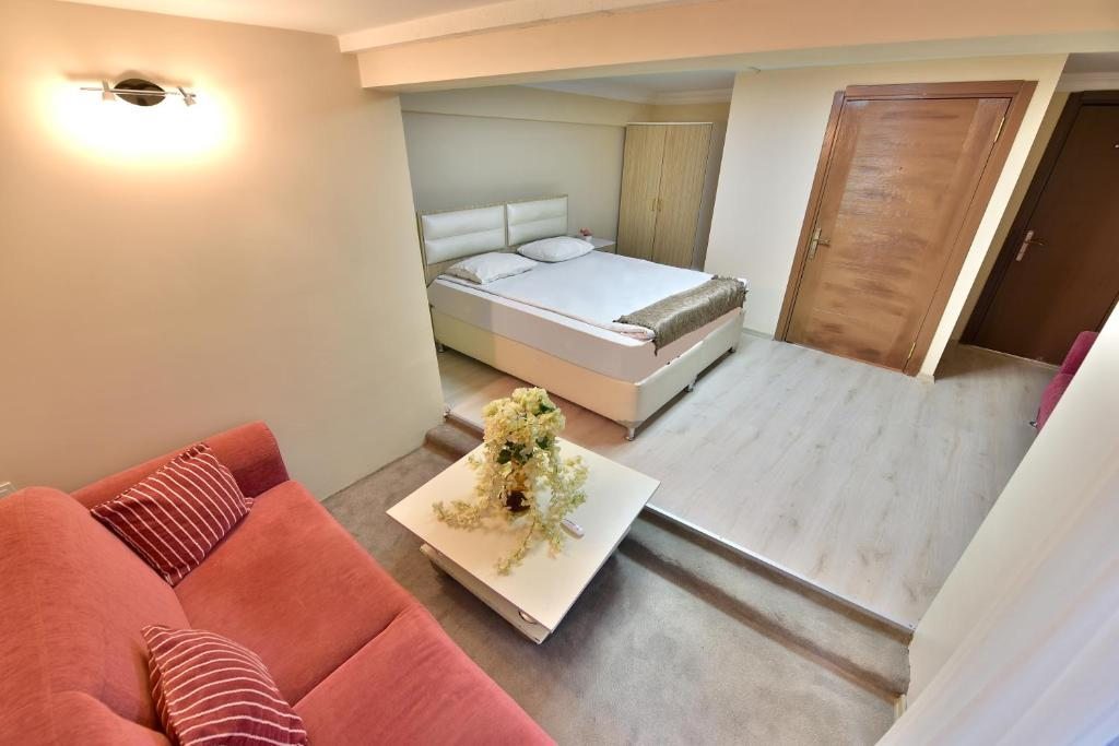 Двухместный (Двухместный номер эконом-класса с 1 кроватью (2 взрослых + 1 ребенок)) отеля Oban Suites Istanbul, Стамбул