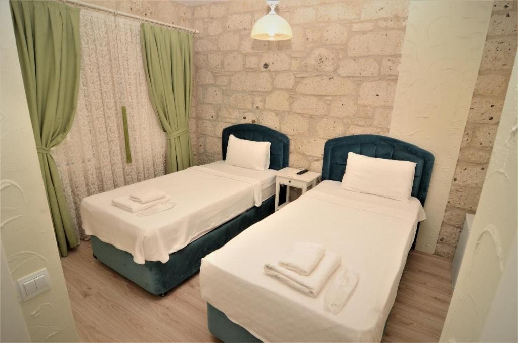 Двухместный (Двухместный номер с 2 отдельными кроватями) отеля Alacati Eldoris Hotel, Алачати