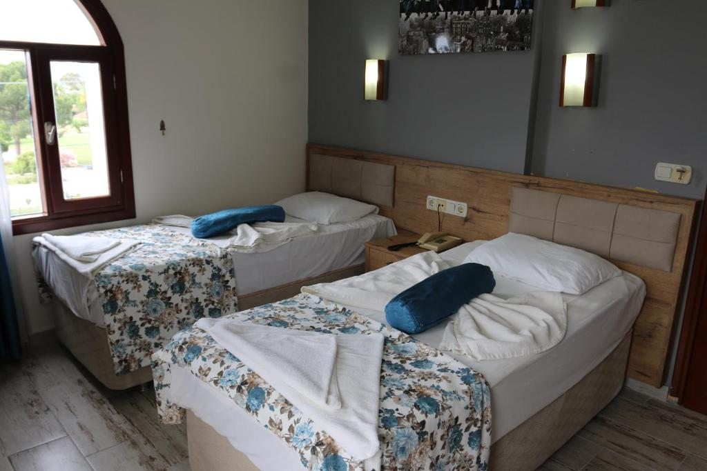Двухместный (Двухместный номер с 2 отдельными кроватями) отеля Eroglu City Hotel, Фетхие