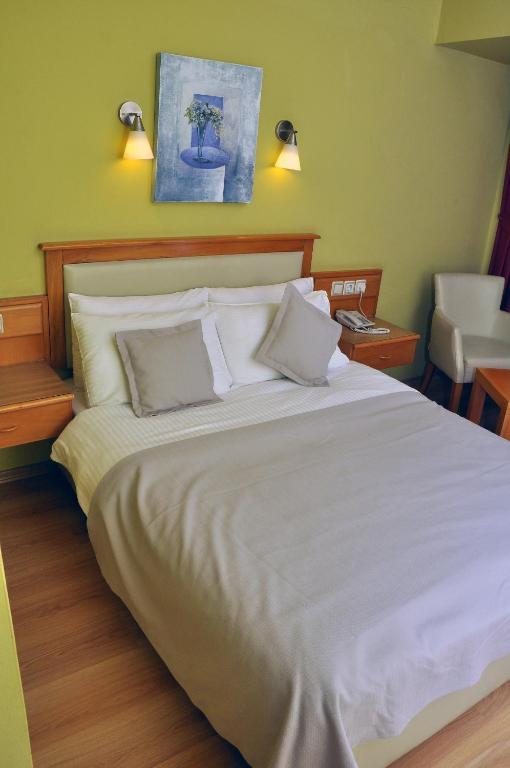 Двухместный (Стандартный двухместный номер с 1 кроватью или 2 отдельными кроватями, вид на море) отеля Hotel Doruk, Фетхие