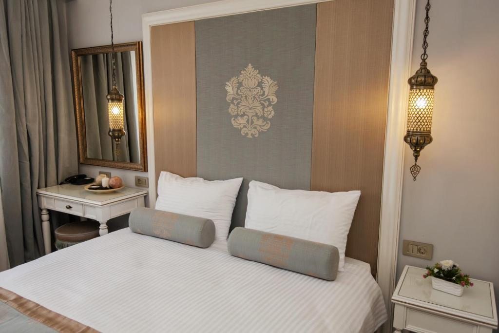 Двухместный (Улучшенный двухместный номер с 1 кроватью или 2 отдельными кроватями) отеля Raymond Blue Hotel, Стамбул