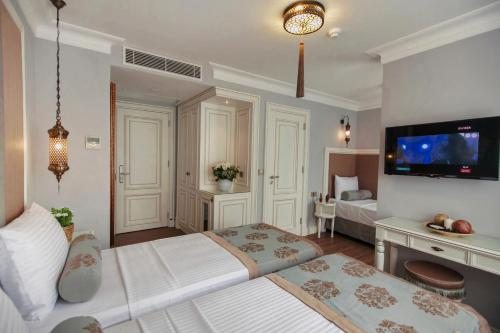 Трехместный (Улучшенный трехместный номер) отеля Raymond Blue Hotel, Стамбул