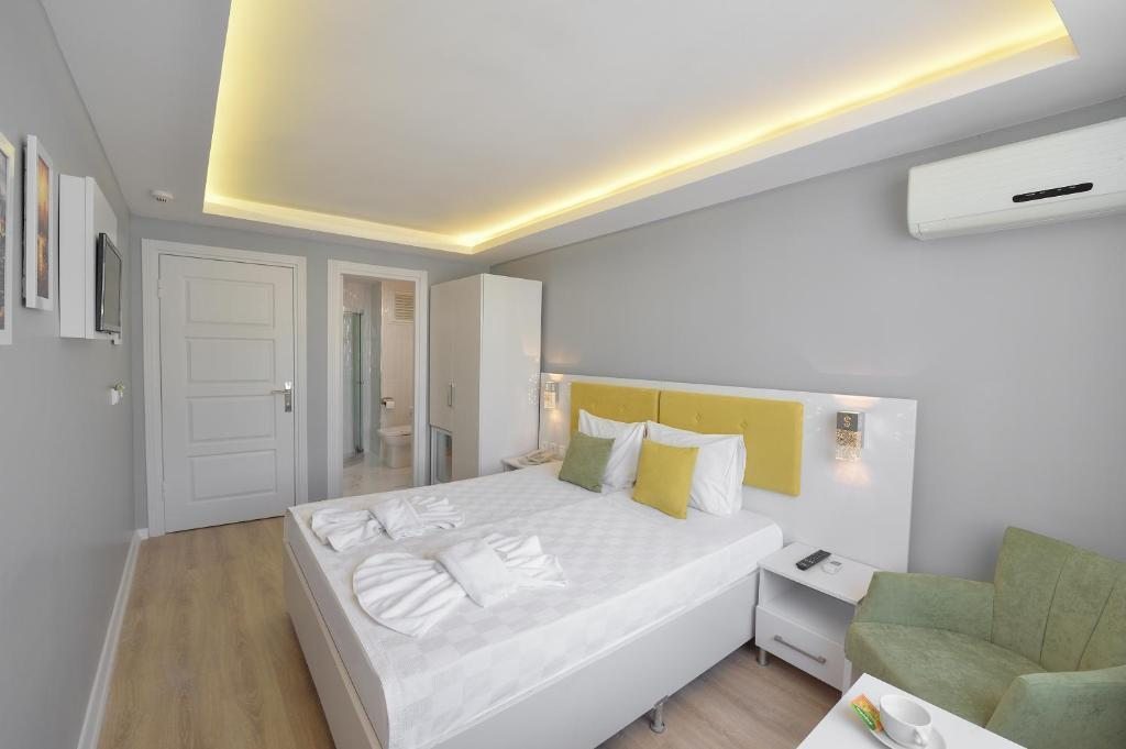 Двухместный (Улучшенный двухместный номер с 1 кроватью или 2 отдельными кроватями) отеля Sayeban Gold Hotel, Стамбул