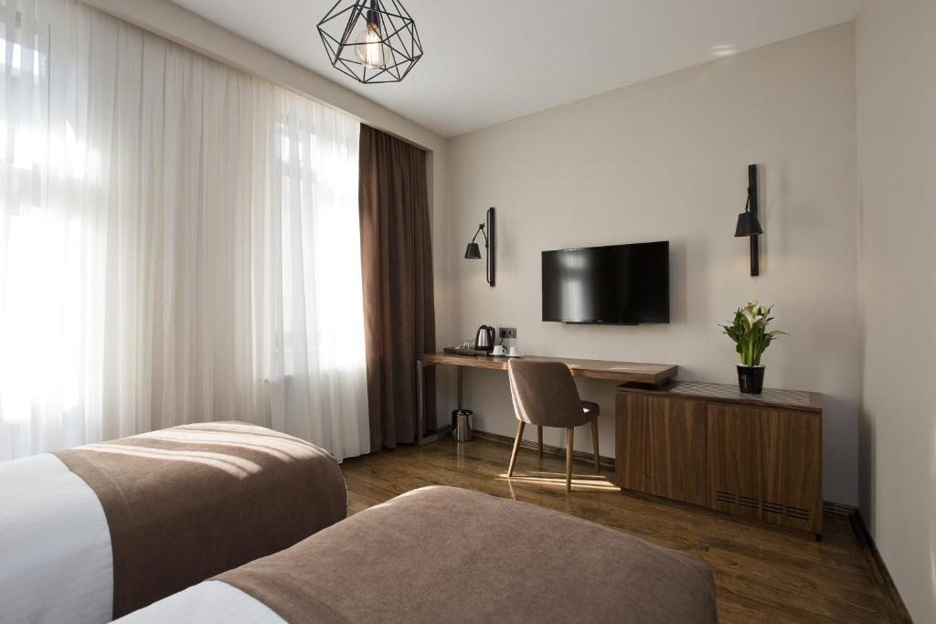 Двухместный (Двухместный номер Делюкс с 2 отдельными кроватями) отеля Snog Rooms & Suites, Стамбул