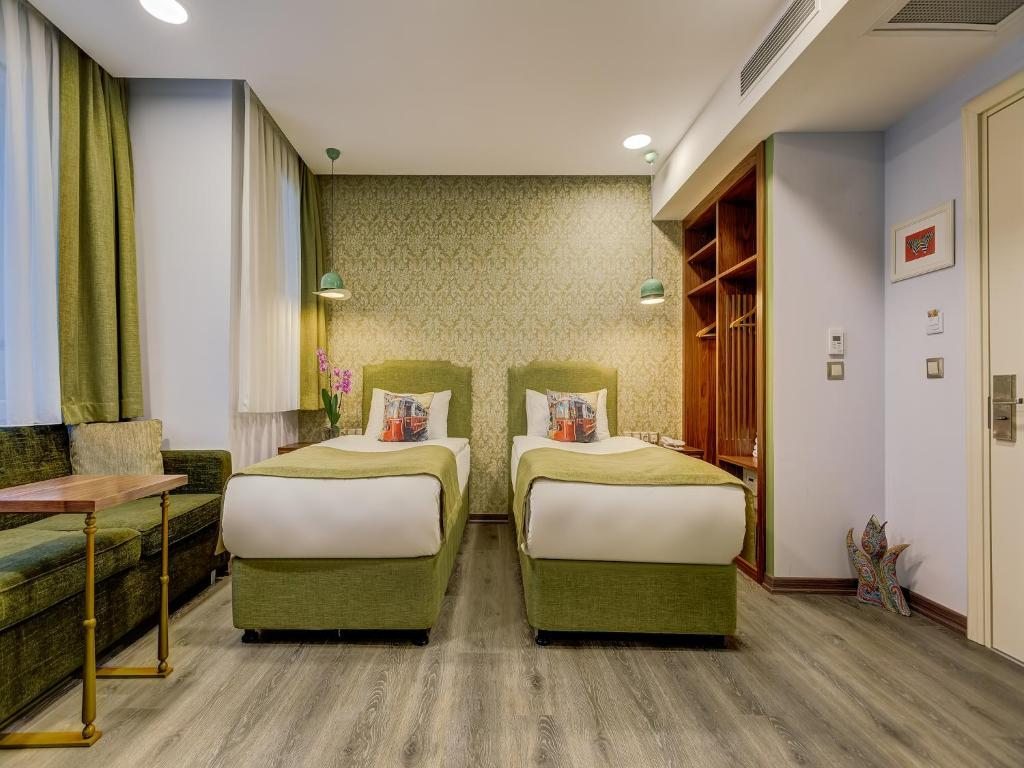 Двухместный (Улучшенный двухместный номер с 2 отдельными кроватями) отеля Sometimes Hotel, Стамбул