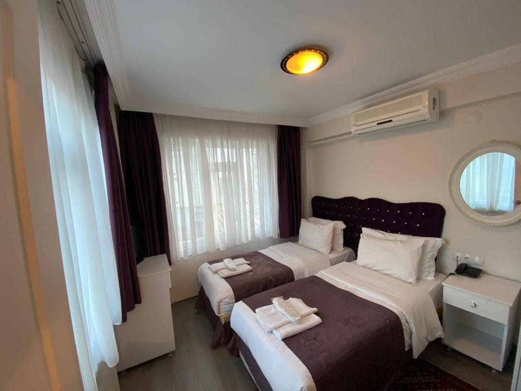 Двухместный (Стандартный двухместный номер с 2 отдельными кроватями) отеля Spinel Hotel, Стамбул