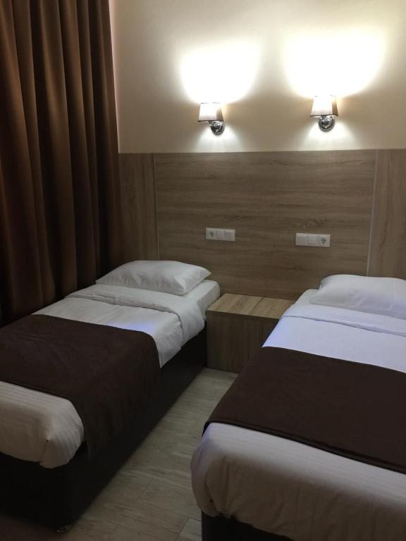 Двухместный (Двухместный номер с 1 кроватью или 2 отдельными кроватями) отеля Арт Отель, Тихорецк