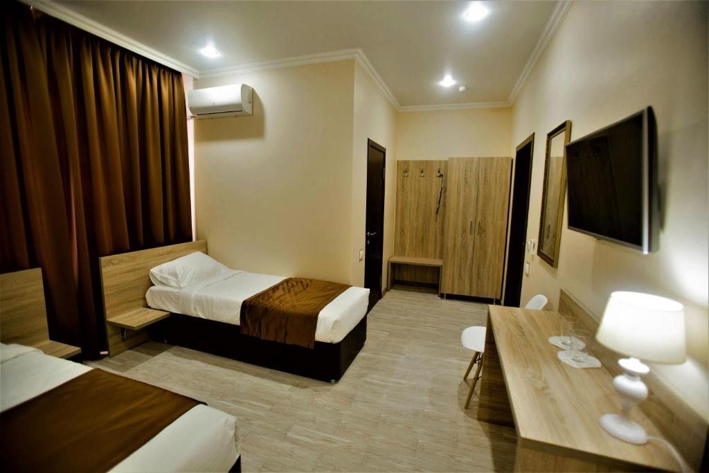 Двухместный (Двухместный номер с 2 отдельными кроватями) отеля Арт Отель, Тихорецк