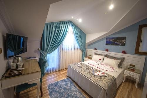 Двухместный (Двухместный номер с 1 кроватью с видом на море) отеля Kayı Hotel, Фетхие