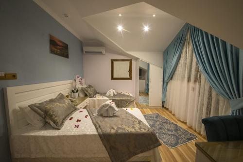 Двухместный (Двухместный номер с 2 отдельными кроватями и видом на море) отеля Kayı Hotel, Фетхие