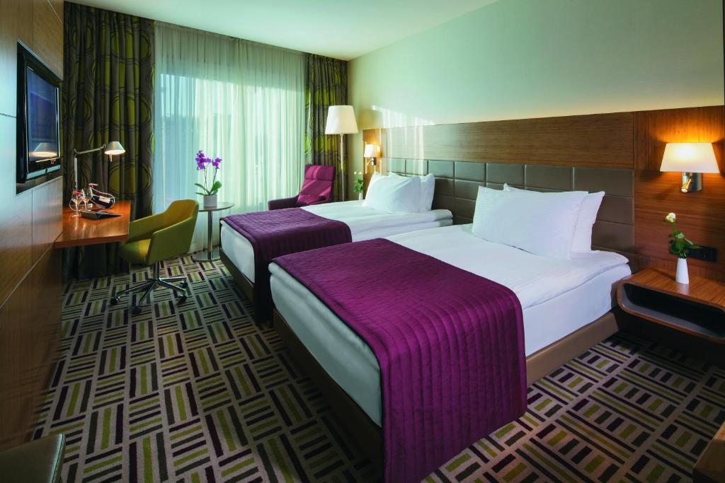 Двухместный (Улучшенный двухместный номер с 2 отдельными кроватями) отеля Movenpick Ankara, Анкара