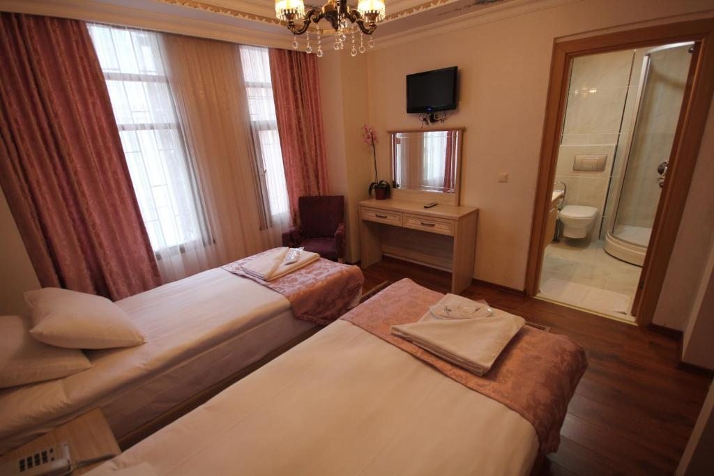 Двухместный (Стандартный двухместный номер с 2 отдельными кроватями) отеля Sultans Royal Hotel, Стамбул