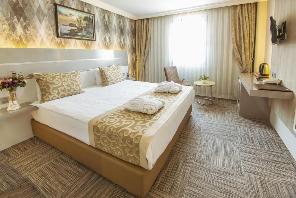Двухместный (Стандартный двухместный номер с 1 кроватью или 2 отдельными кроватями) отеля Aldino, Анкара