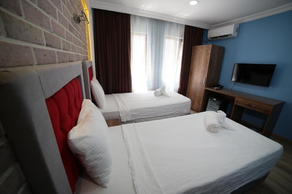 Двухместный (Двухместный номер с 1 кроватью или 2 отдельными кроватями) отеля Taksim Park Suites, Стамбул