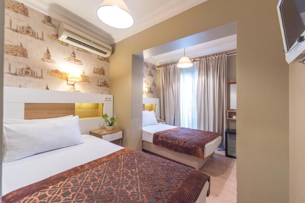Двухместный (Двухместный номер эконом-класса с 1 кроватью или 2 отдельными кроватями) отеля Tayahatun Hotel, Стамбул