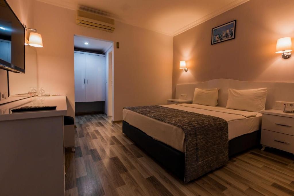 Двухместный (Стандартный двухместный номер с 1 кроватью или 2 отдельными кроватями) отеля Karbel, Олюдениз