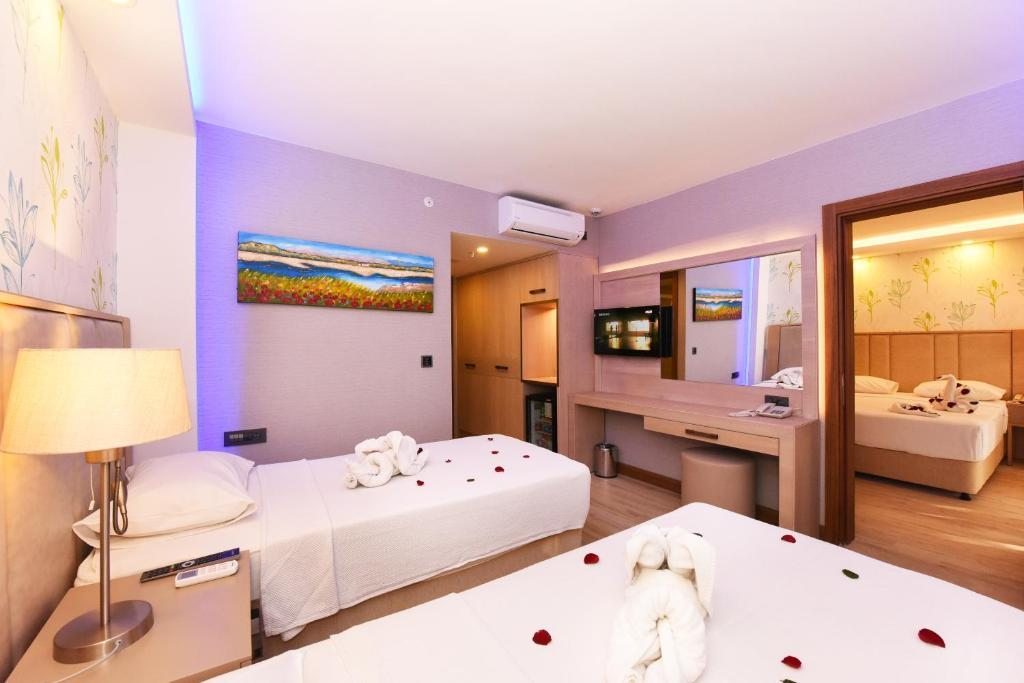 Семейный (Улучшенный семейный номер с 2 спальнями) курортного отеля Liberty Hotels Oludeniz, Олюдениз