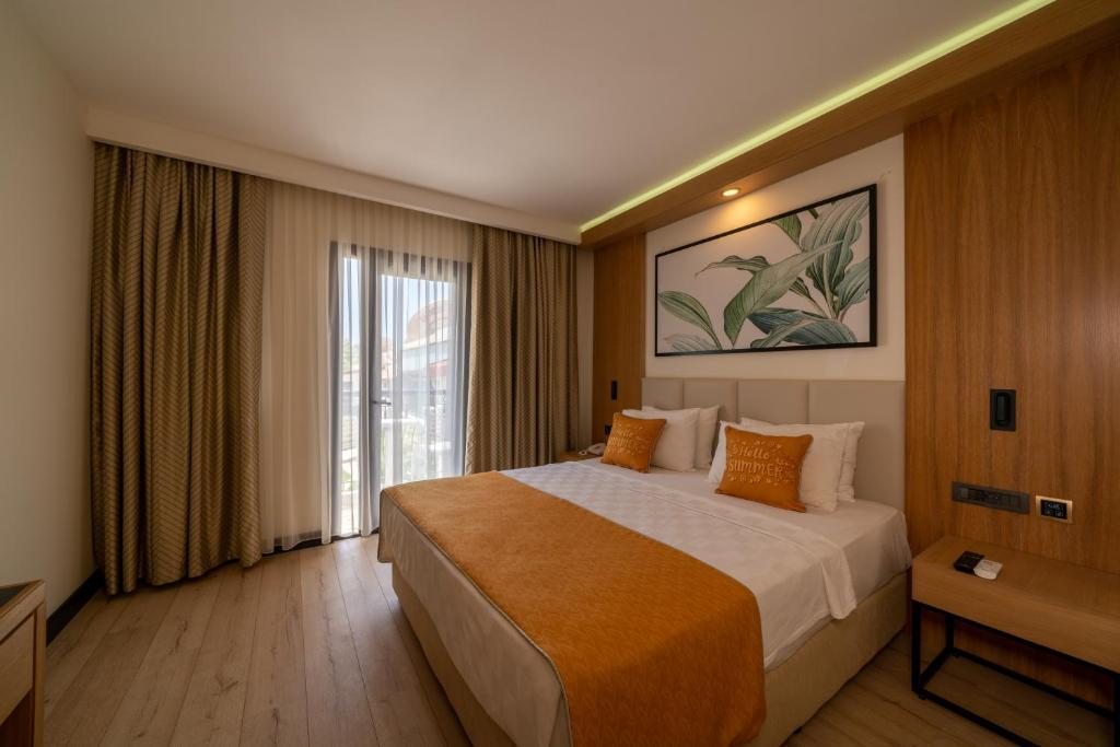 Двухместный (Улучшенный двухместный номер с 1 кроватью или 2 отдельными кроватями) курортного отеля Liberty Hotels Oludeniz, Олюдениз
