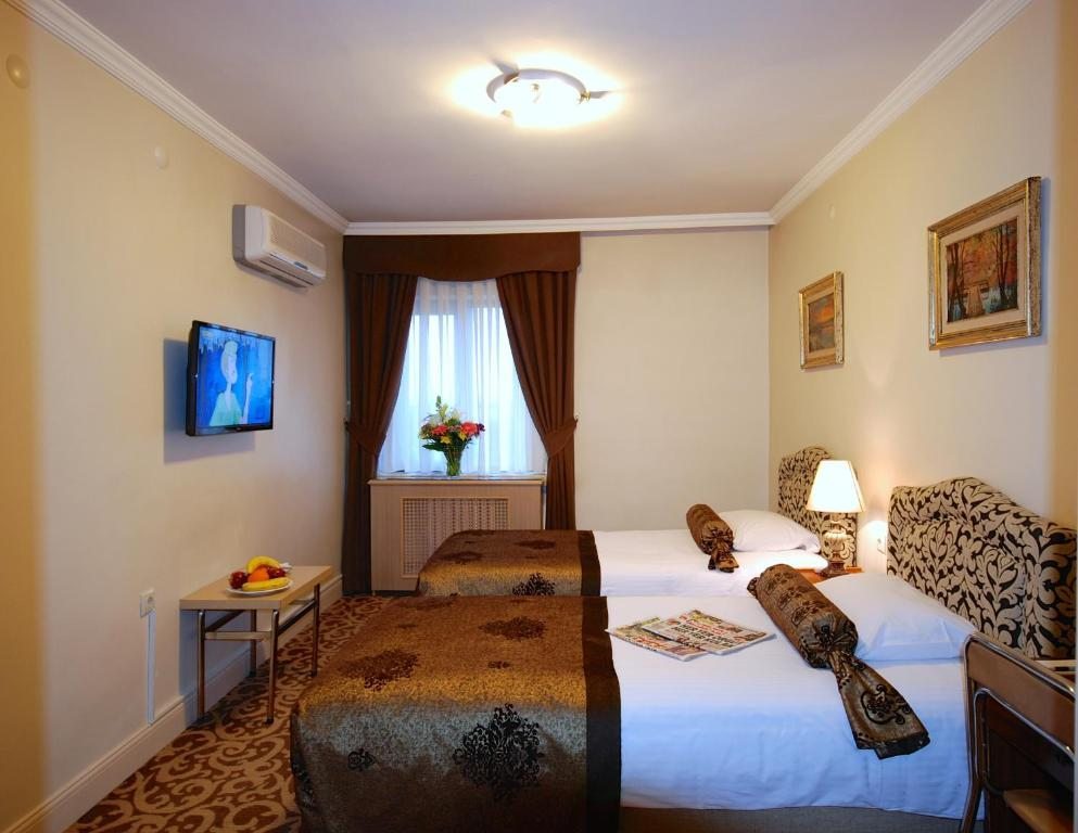 Двухместный (Двухместный номер с 1 кроватью или 2 отдельными кроватями) отеля Hotel Mithat, Анкара