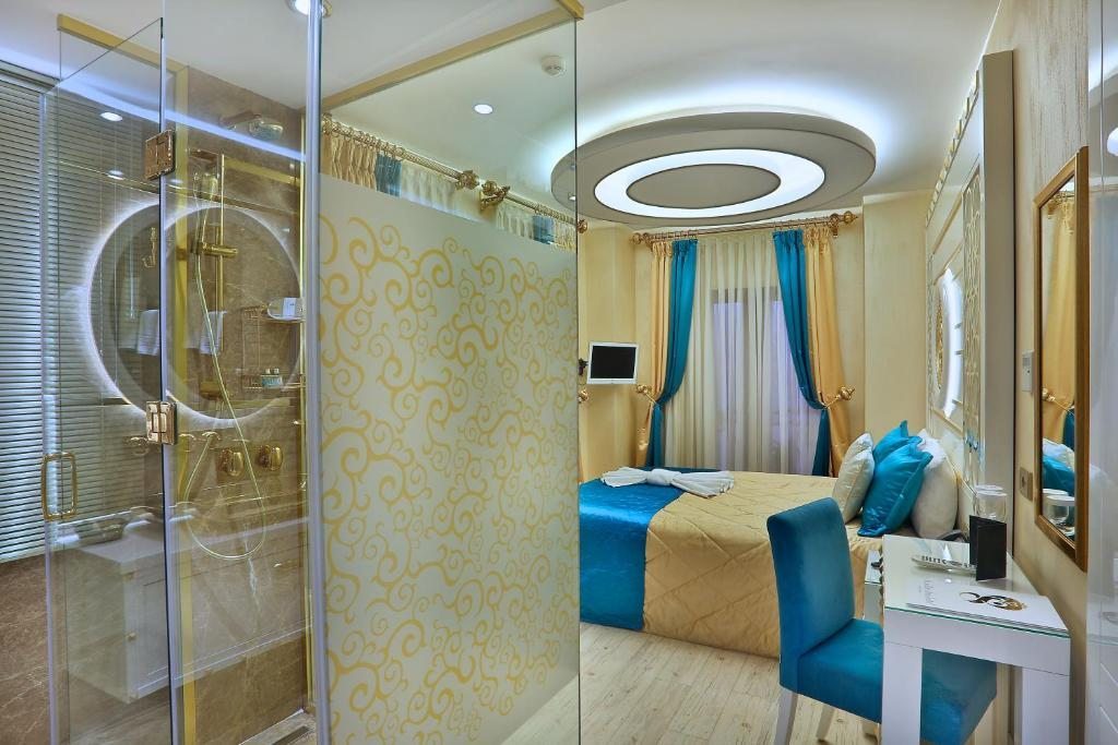 Двухместный (Специальное предложение с романтическим пакетом услуг - Двухместный номер с 1 кроватью) отеля The Million Stone Hotel - Special Category, Стамбул