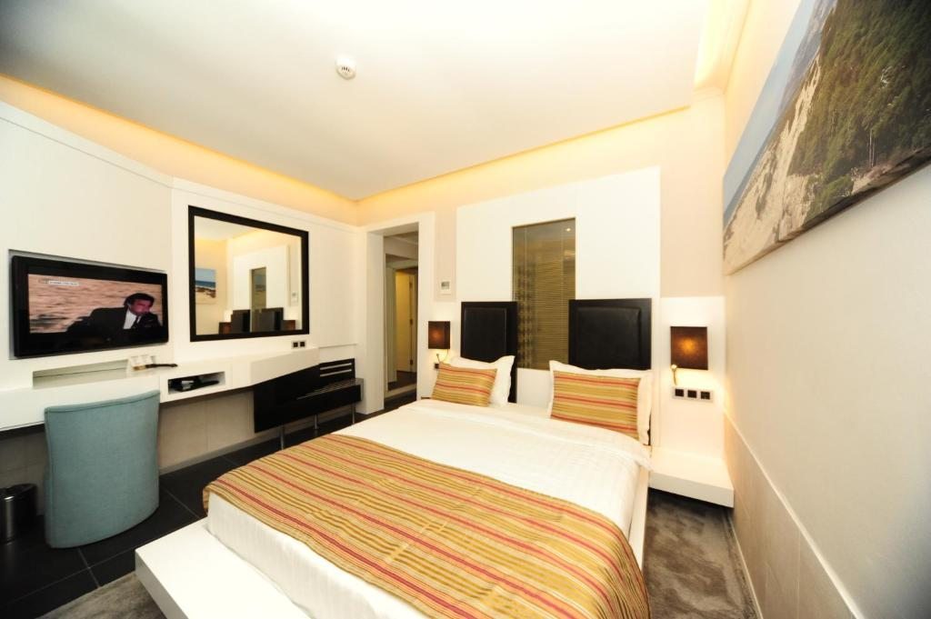 Двухместный (Стандартный двухместный номер с 1 кроватью или 2 отдельными кроватями и балконом) отеля Orka Sunlife Resort, Олюдениз