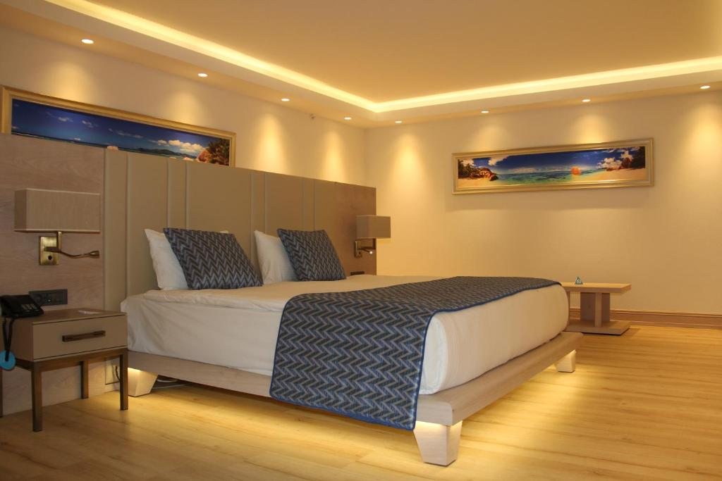 Сьюит (Люкс с кроватью размера «king-size») курортного отеля Sentido Lykia Resort & SPA, Олюдениз