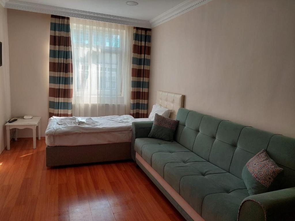 Четырехместный (Четырехместный номер Делюкс) отеля Timeks Anatolia Suites, Стамбул