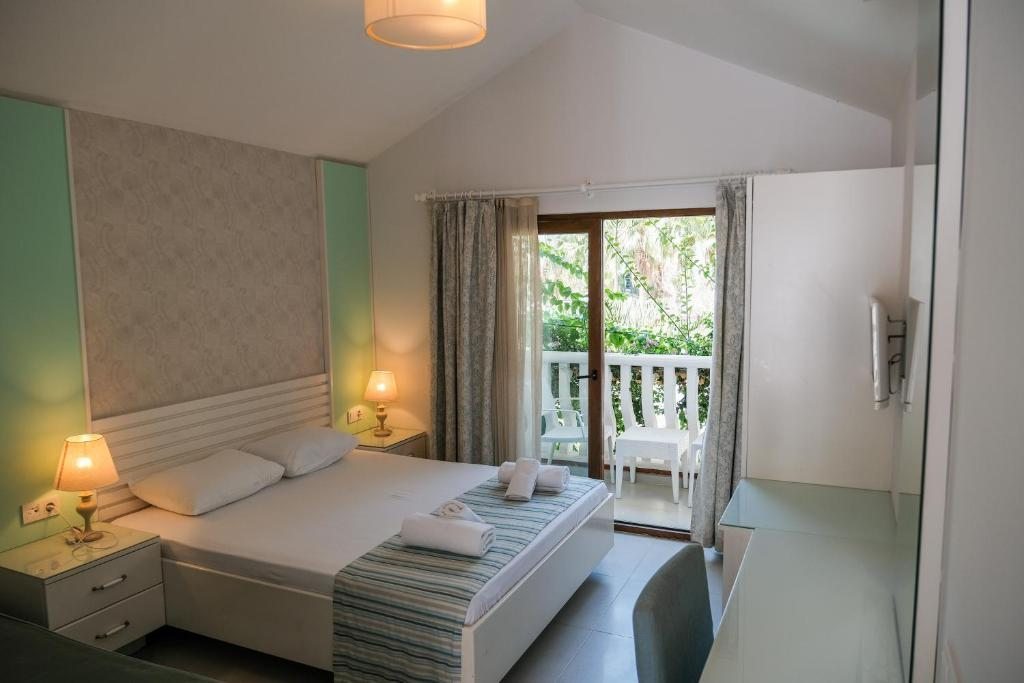 Двухместный (Улучшенный двухместный номер с 1 кроватью) отеля Flamingo, Олюдениз