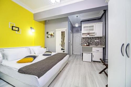 Двухместный (Двухместный номер Делюкс с 2 отдельными кроватями) отеля Unique Suite Hotel, Стамбул