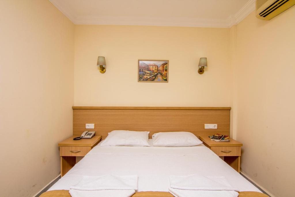 Двухместный (Стандартный двухместный номер с 1 кроватью или 2 отдельными кроватями) отеля Karbel Sun, Олюдениз