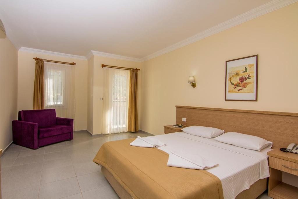 Двухместный (Двухместный номер Делюкс с 1 кроватью или 2 отдельными кроватями) отеля Karbel Sun, Олюдениз