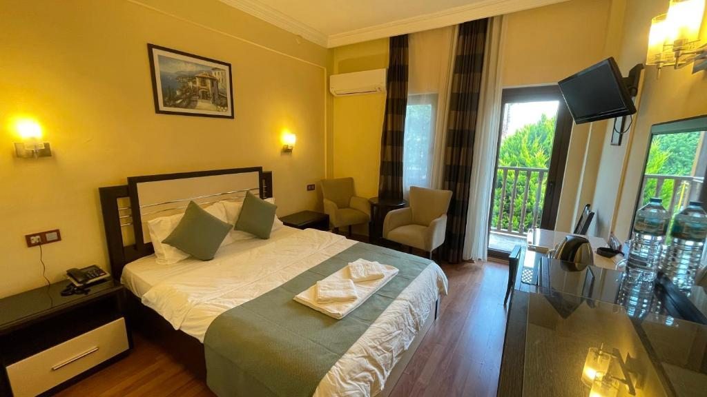 Двухместный (Двухместный номер с 1 кроватью или 2 отдельными кроватями) отеля Hotel Oludeniz, Олюдениз