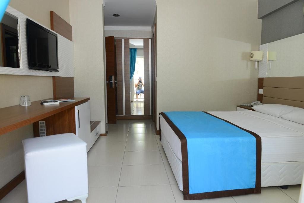 Двухместный (Стандартный двухместный номер с 1 кроватью или 2 отдельными кроватями) отеля Marcan Resort Hotel, Олюдениз